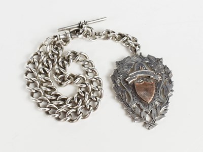 Lot 145 - A silver albert chain with bar and crab claw...