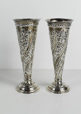 Lot 427 - A pair of silver bud vases, with weighted...