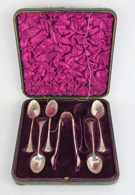 Lot 241 - A boxed set of silver spoons and sugar nips,...