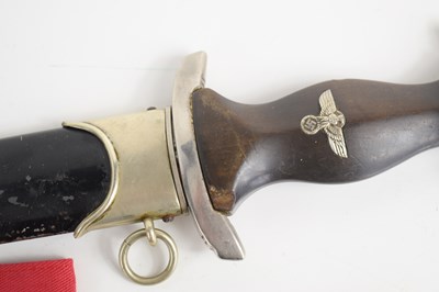 Lot 200 - A WWII German SS dagger and scabbard, the...
