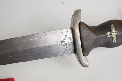 Lot 200 - A WWII German SS dagger and scabbard, the...