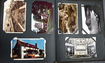 Lot 111 - Two albums of Edwardian and later postcards...