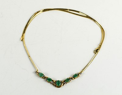 Lot 95 - A 9ct gold diamond and emerald necklace of...