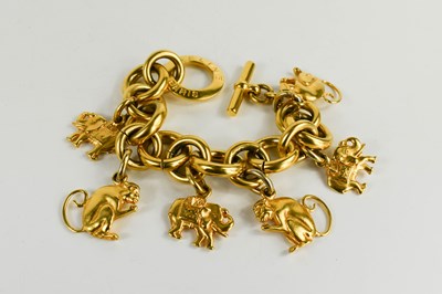 Lot 104 - A vintage Celine Paris charm bracelet, the...