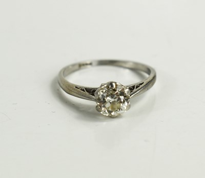 Lot 13 - A diamond and platinum solitaire ring, the...