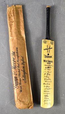 Lot 67a - A vintage Gunn & Moore miniatiure cricket bat,...