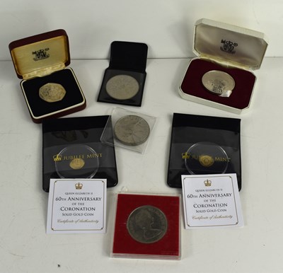 Lot 291a - Two 9ct gold coins commemorating the 60th...