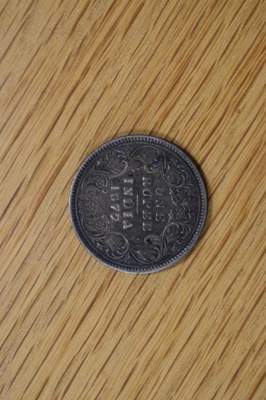 Lot 364 - A group of coins to include a silver 1878...