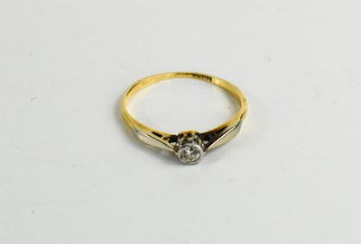 Lot 229 - An 18ct gold and diamond solitaire ring, size...