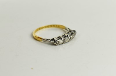 Lot 43 - An 18ct gold, platinum and diamond ring, the...