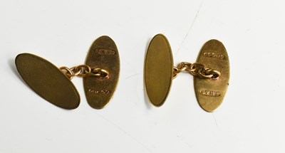Lot 45 - A pair of 9ct gold cufflinks of oval form,...