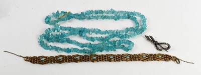 Lot 169 - A deep aquamarine coloured hardstone necklace,...