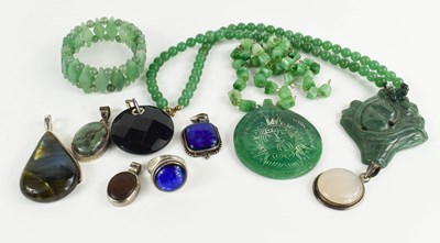 Lot 203 - A selection of jade jewellery to include...