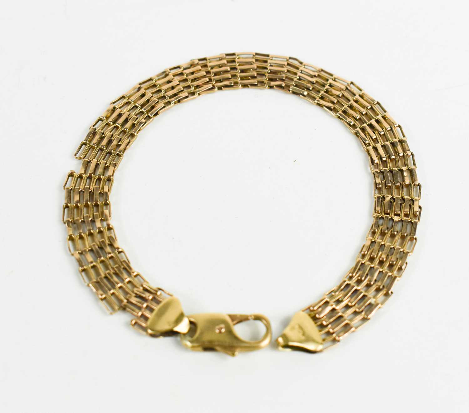 Lot 55 - A 9ct gold gate link bracelet, 18cm long, 5.8g.