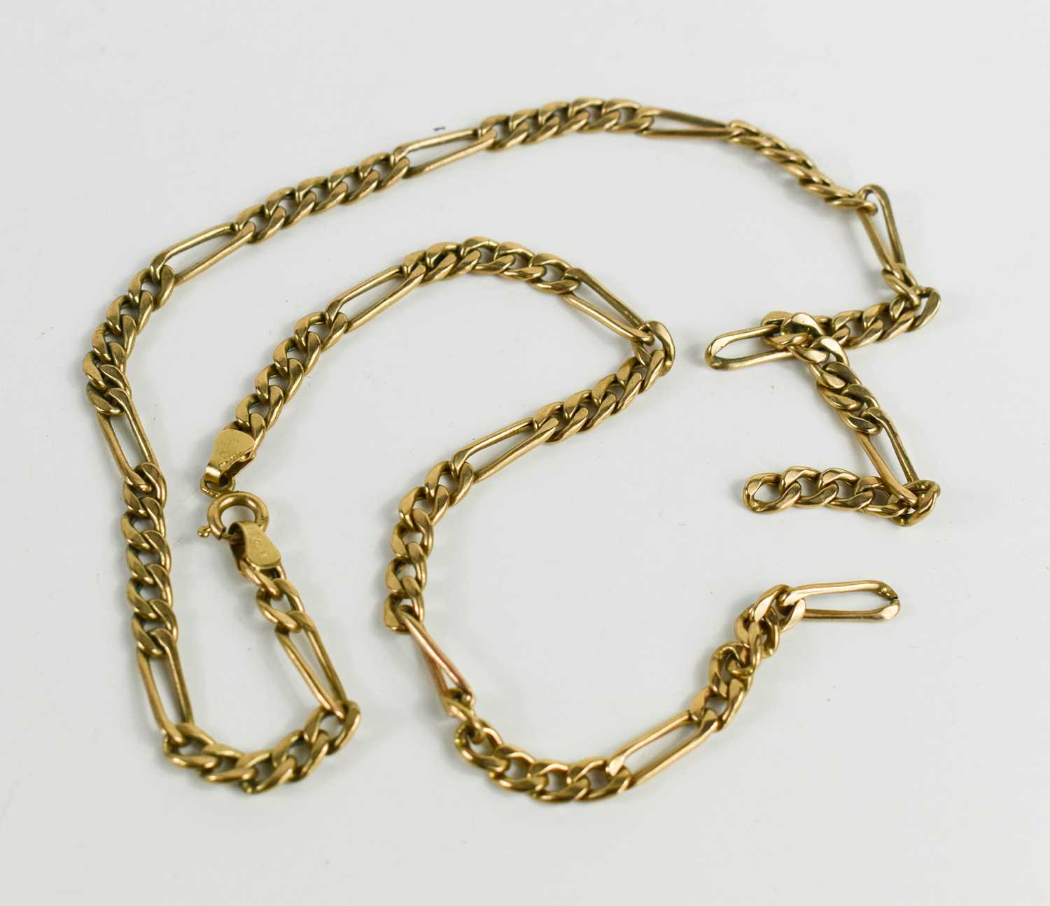 Lot 86 - A 9ct gold figaro link chain, 47cm long, 7.59g.