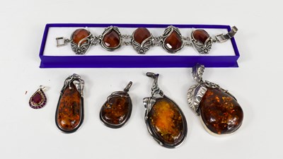 Lot 204 - A selection of silver and Baltic amber...