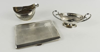 Lot 450 - A group of silver comprising a two handled...