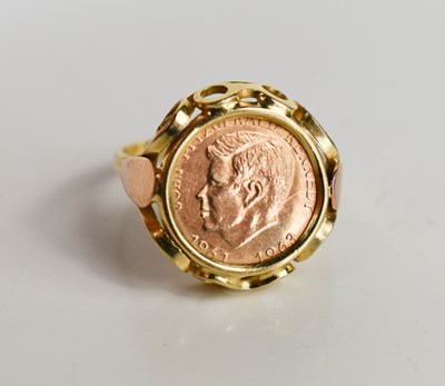 Lot 22 - A 14ct gold ring set with a gold John F...