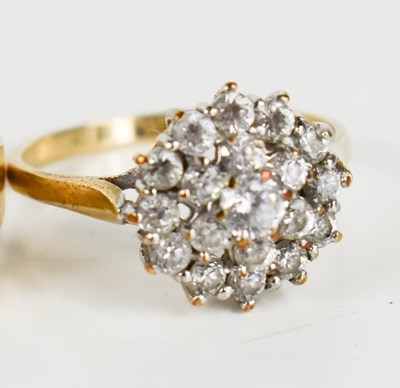 Lot 214 - A 9ct gold and cubic zirconia cluster ring,...