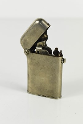 Lot 301 - A Thorens Swiss made petrol lighter January...