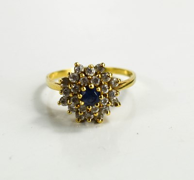 Lot 87 - A 14ct gold, sapphire and white stone cluster...