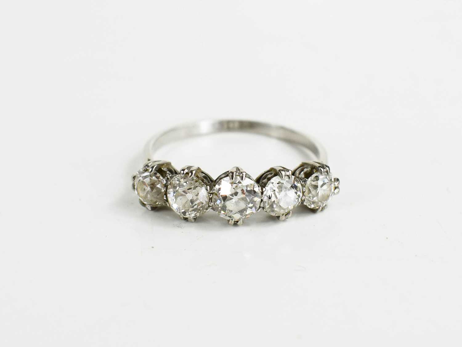 Lot 14 - A diamond five stone ring, the largest central...