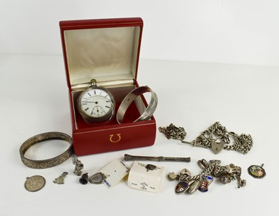 Lot 247 - A group of silver jewellery including charm...