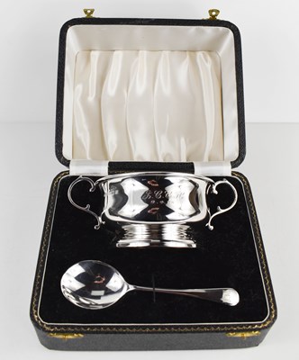 Lot 449 - A silver two handled porringer and spoon,...