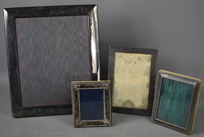 Lot 422 - A silver photograph frame bearing initials H.J....