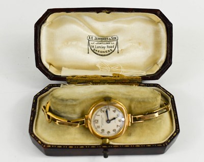 Lot 373 - A vintage 9ct gold lady's wrist watch, Uno...