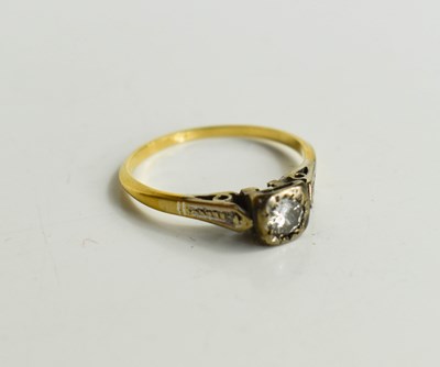 Lot 57 - A diamond solitaire ring, the illusion set...