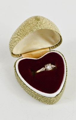Lot 57 - A diamond solitaire ring, the illusion set...