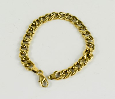 Lot 133 - An 18ct gold curb link bracelet, 19cm long, 10....