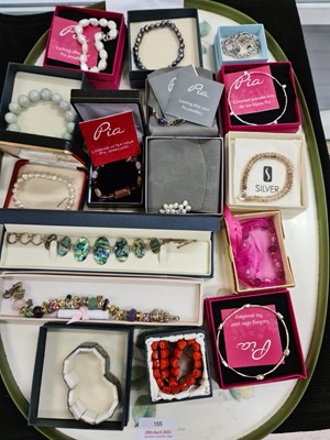 Lot 155 - A group of bracelets and bangles to include...