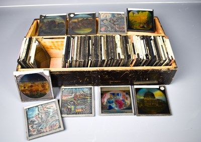 Lot 237 - A collection of eighty three glass slides,...