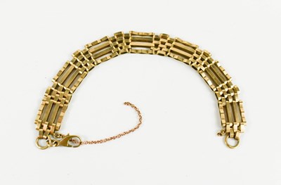 Lot 108 - A 9ct gold gate link bracelet with crab claw...