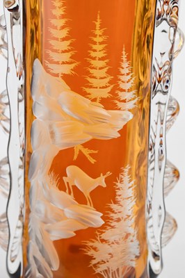 Lot 104 - A tall amber and transluscent cut glass vase,...
