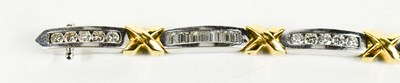 Lot 15 - An 18ct white & yellow gold and diamond...