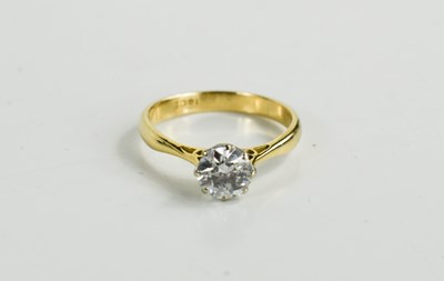 Lot 150 - An 18ct gold and diamond solitaire ring, the...