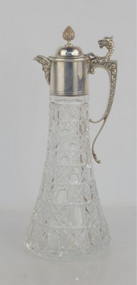 Lot 257 - A silver topped cut glass claret jug of...