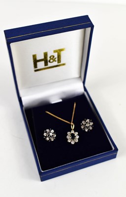 Lot 109 - A 9ct gold pendant and earrings, the pendant...
