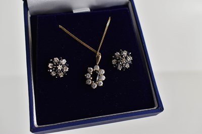 Lot 109 - A 9ct gold pendant and earrings, the pendant...