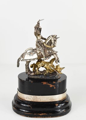 Lot 403 - A silver gilt statuette of St George & the...