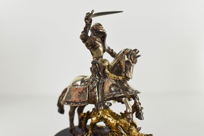 Lot 403 - A silver gilt statuette of St George & the...