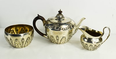 Lot 410 - A three piece silver bachelors tea set, London...