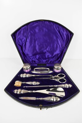 Lot 397 - A silver vanity set, comprising nine...