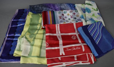 Lot 200 - A group of designer silk scarves comprising...