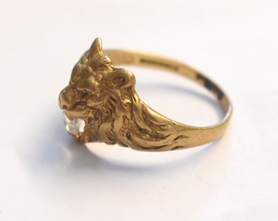 Lot 84 - A 9ct gold ring modelled as a lions head, its...