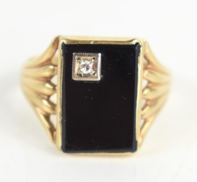 Lot 44a - A gentleman's 9ct gold, jet and diamond ring,...