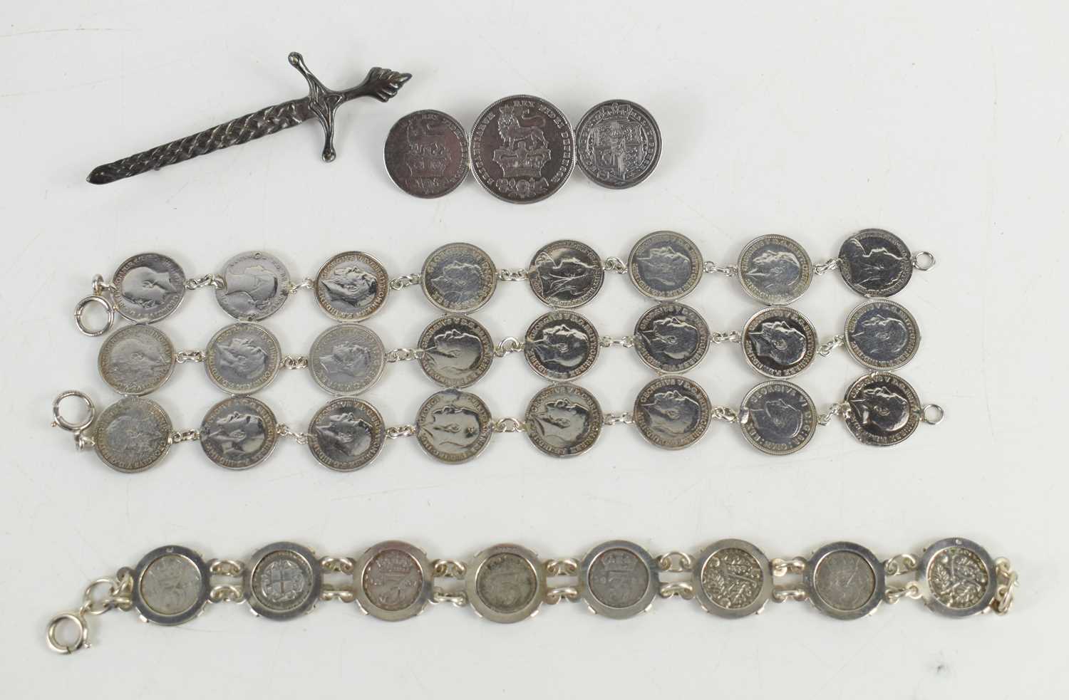 Lot 45 - A group of silver coinage jewellery comprising...